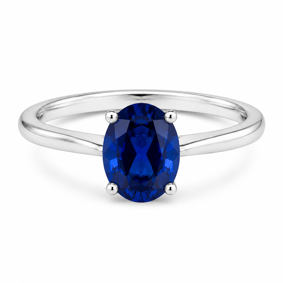 Oval simulated blue sapphire solitaire ring in polished 925 sterling silver
