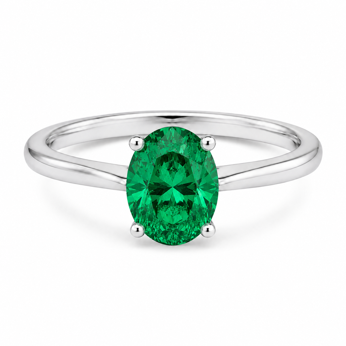 Oval simulated emerald solitaire ring in polished 925 sterling silver