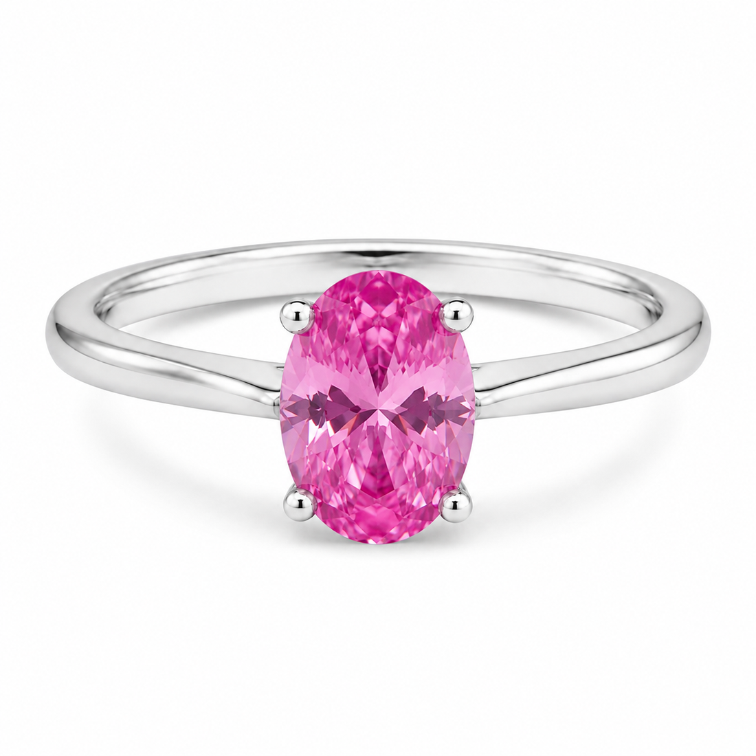 Oval simulated pink sapphire solitaire ring in polished 925 sterling silver
