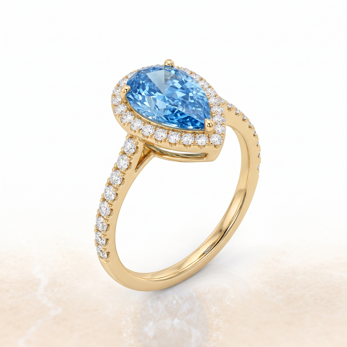 Blue Pear-Shaped Lab-Grown Diamond Halo Engagement Ring three-quarter catalog view on white background