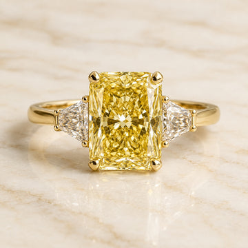 Radiance radiant-cut yellow lab-grown diamond three-stone engagement ring with clear side stones