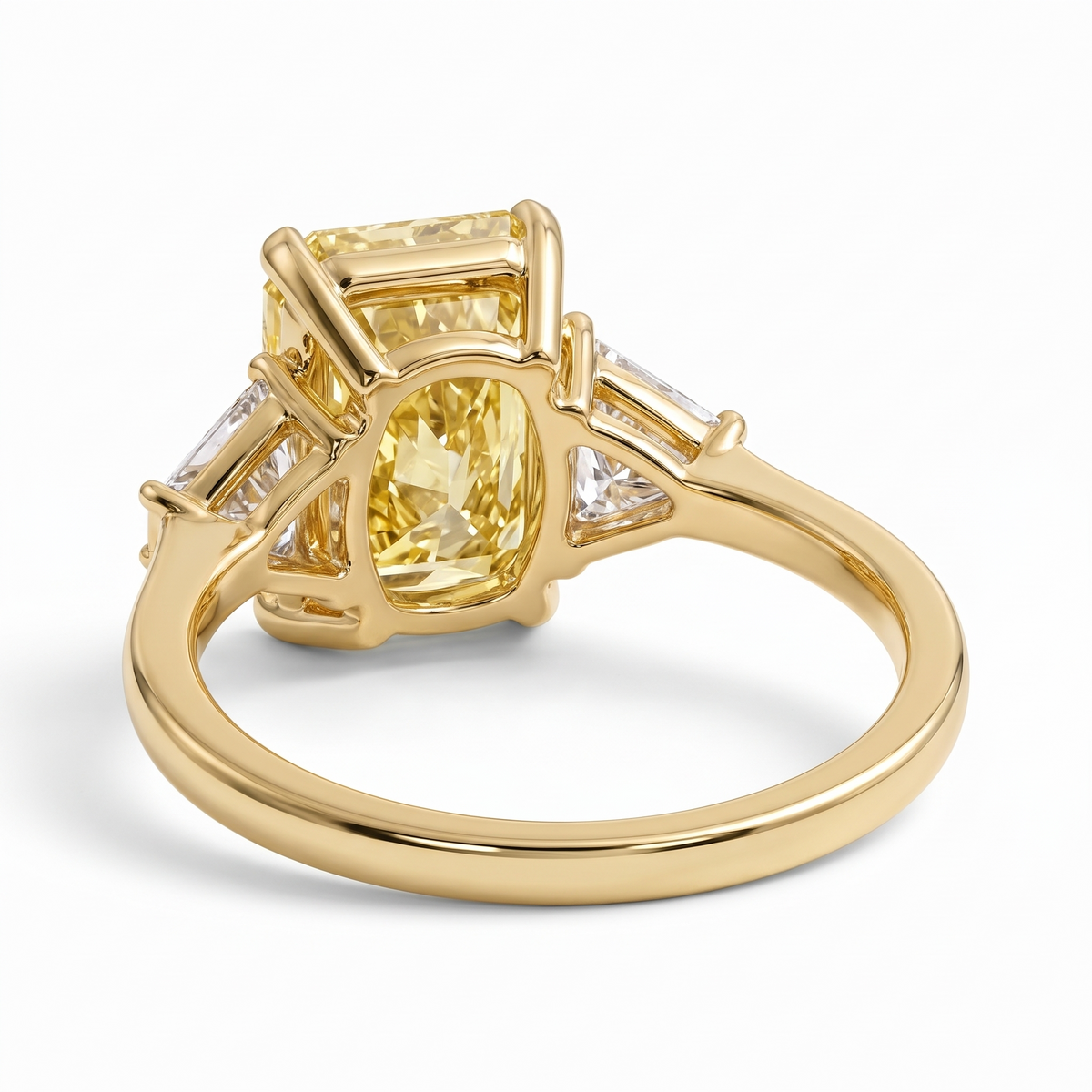 Radiance yellow radiant-cut lab-grown diamond three-stone engagement ring rear three-quarter catalog view on white background