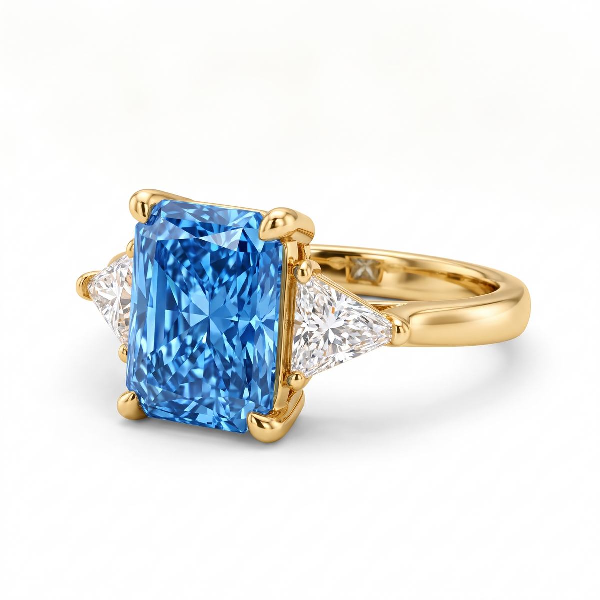 Radiant-Cut Blue Lab-Grown Diamond Three-Stone Engagement Ring three-quarter catalog view on white background