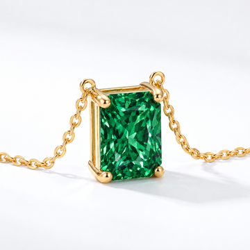Radiant-Cut Emerald Solitaire Necklace in Solid Gold, main image — AI-generated design representation