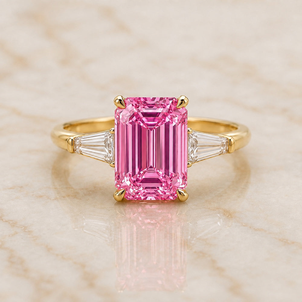 Regent emerald-cut pink lab-grown diamond three-stone engagement ring in yellow gold