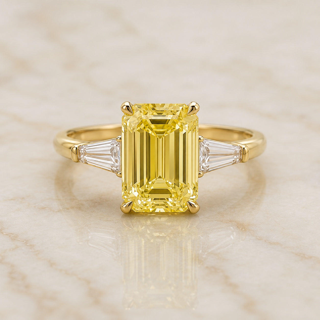 Regent emerald-cut yellow lab-grown diamond three-stone engagement ring with tapered side stones