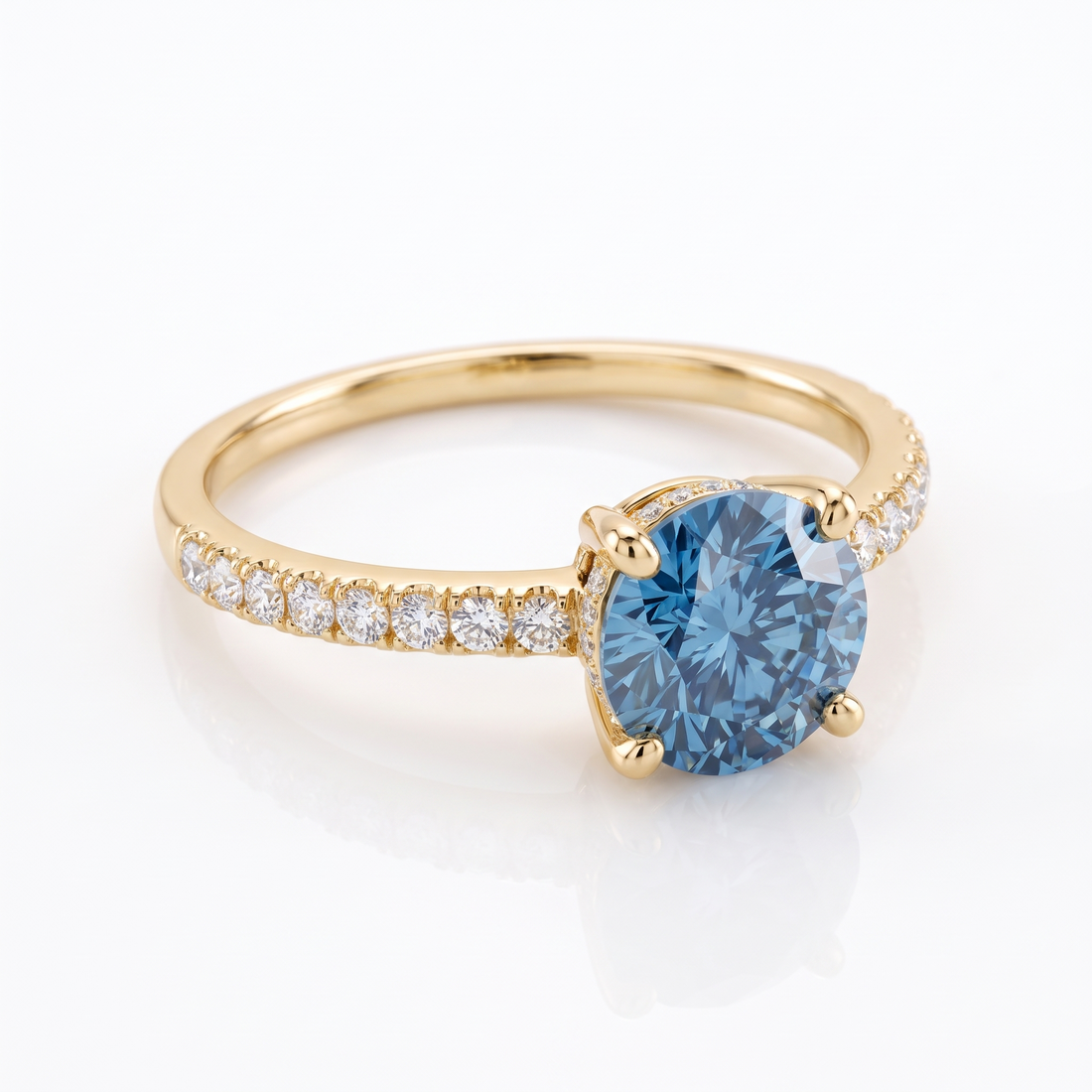 Blue Round Lab-Grown Diamond Pavé Engagement Ring three-quarter catalog view on white background