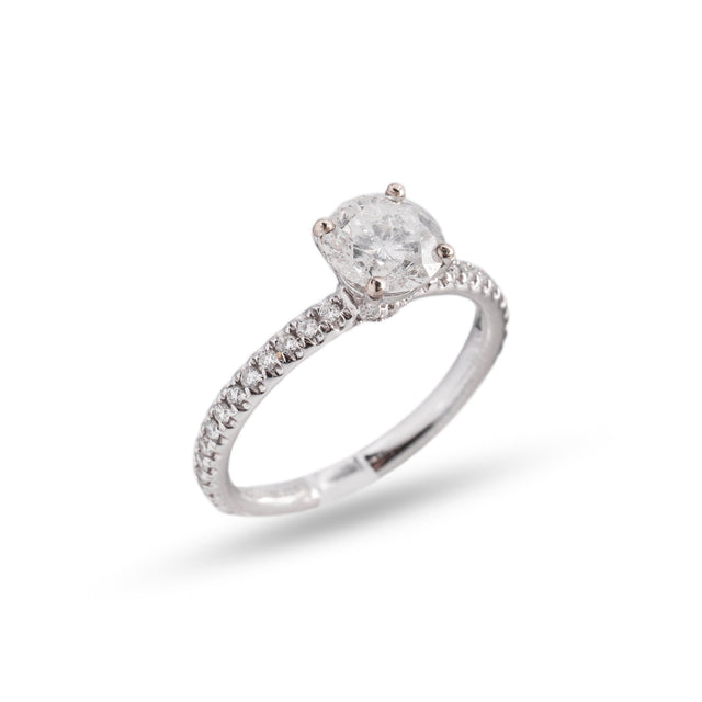 Round solitaire natural diamond engagement ring with pavé band in white gold, three-quarter view — Design 8