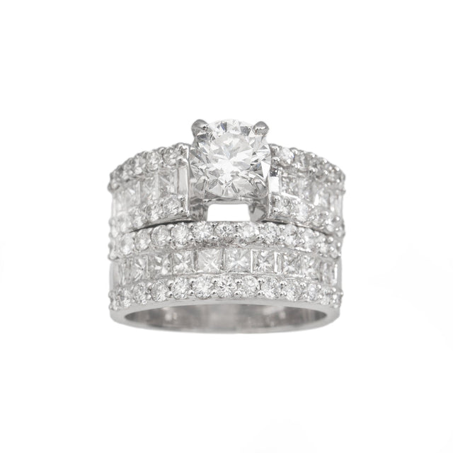 Round solitaire natural diamond engagement ring with channel-set band in white gold, three-quarter view — Design 3