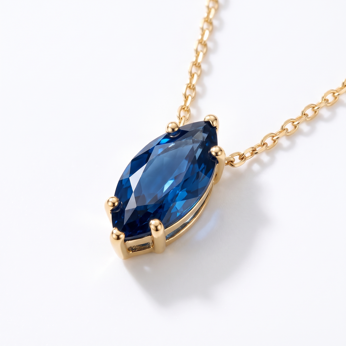 Marquise-cut blue sapphire solitaire necklace, gemstone and setting detail — AI-generated design representation