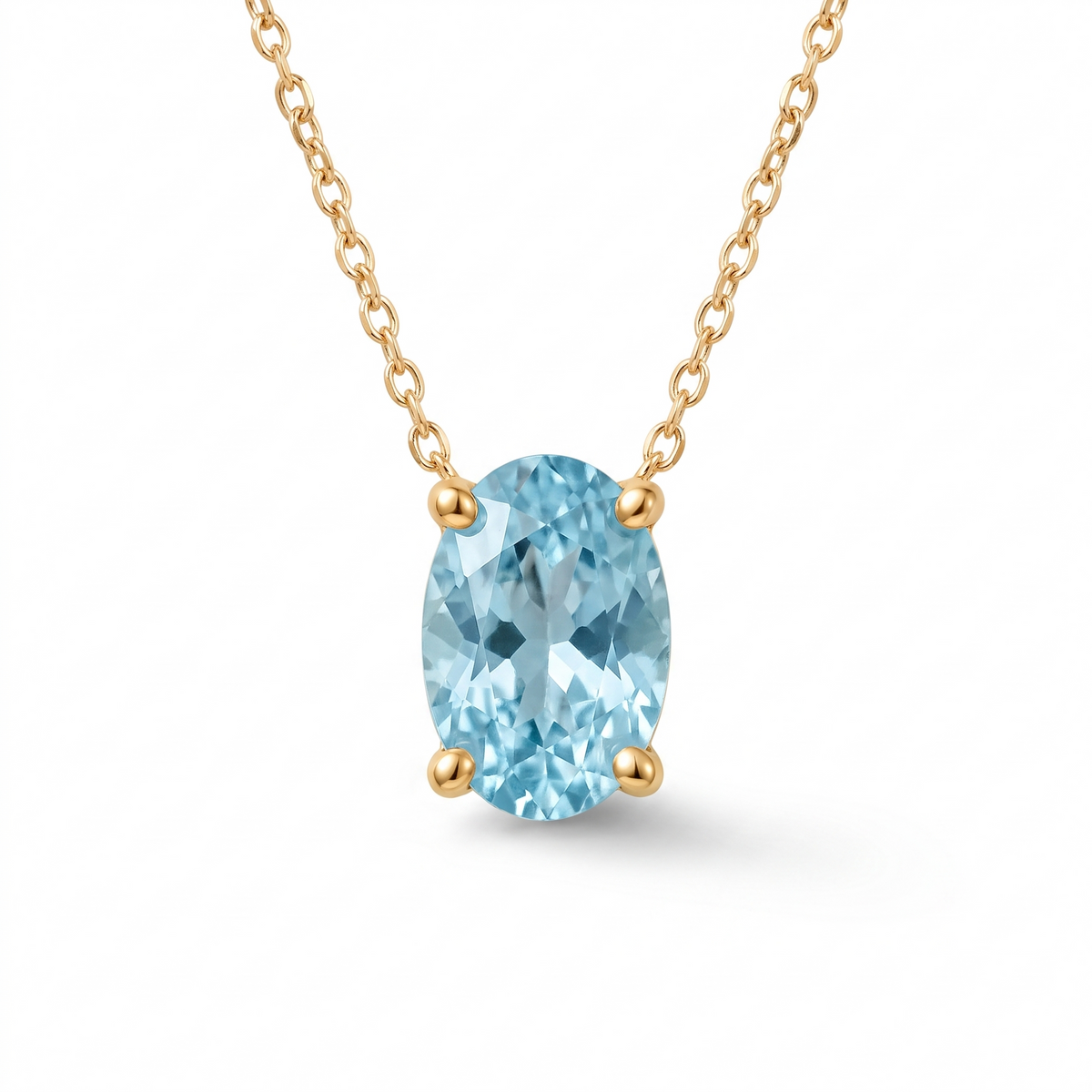 Oval-cut aquamarine solitaire necklace in solid gold, catalog view — AI-generated design representation