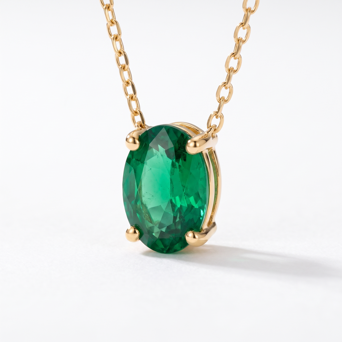 Oval-cut emerald solitaire necklace, gemstone and setting detail — AI-generated design representation