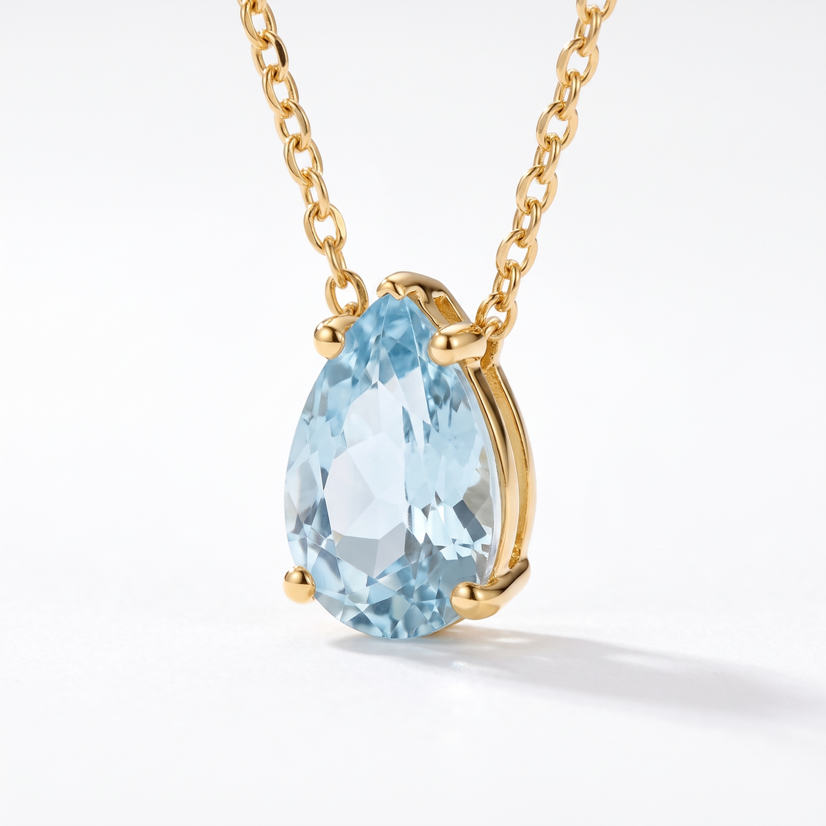 Pear-cut aquamarine solitaire necklace, gemstone and setting detail — AI-generated design representation
