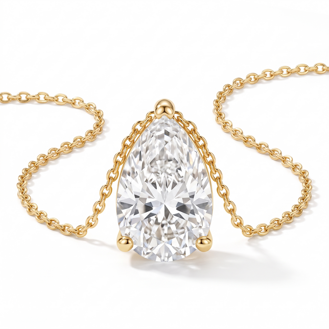 Pear-cut diamond solitaire necklace in solid gold, catalog view — AI-generated design representation