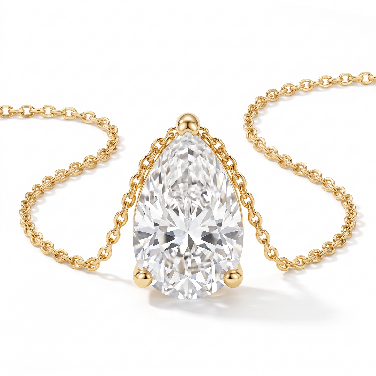 Pear-cut diamond solitaire necklace in solid gold, catalog view — AI-generated design representation