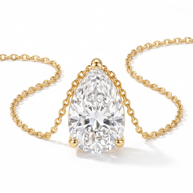 Pear-cut diamond solitaire necklace in solid gold, catalog view — AI-generated design representation