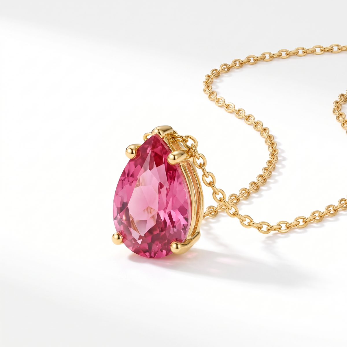 Pear-cut pink tourmaline solitaire necklace, angled front detail — AI-generated design representation