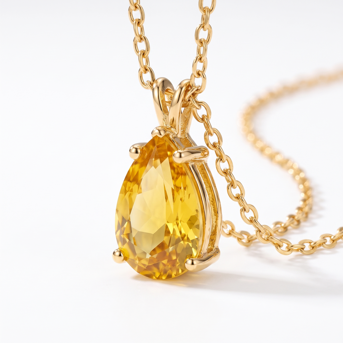 Pear-cut yellow sapphire solitaire necklace, gemstone and setting detail — AI-generated design representation