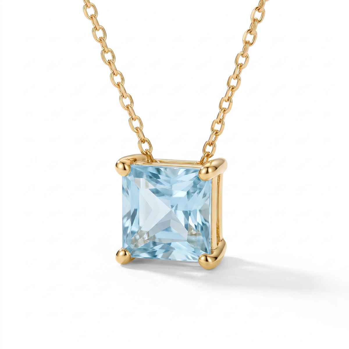 Princess-cut aquamarine solitaire necklace, angled front detail — AI-generated design representation