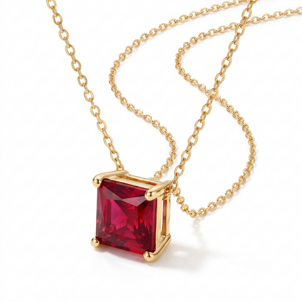 Princess-cut ruby solitaire necklace in solid gold, catalog view — AI-generated design representation
