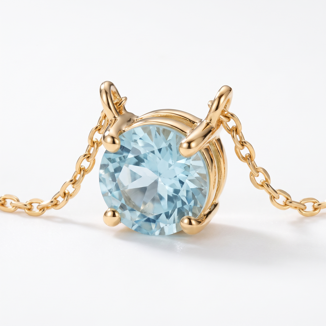 Round-cut aquamarine solitaire necklace, gemstone and setting detail — AI-generated design representation