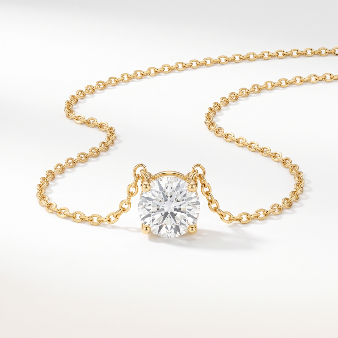 Round-cut diamond solitaire necklace in solid gold, catalog view — AI-generated design representation