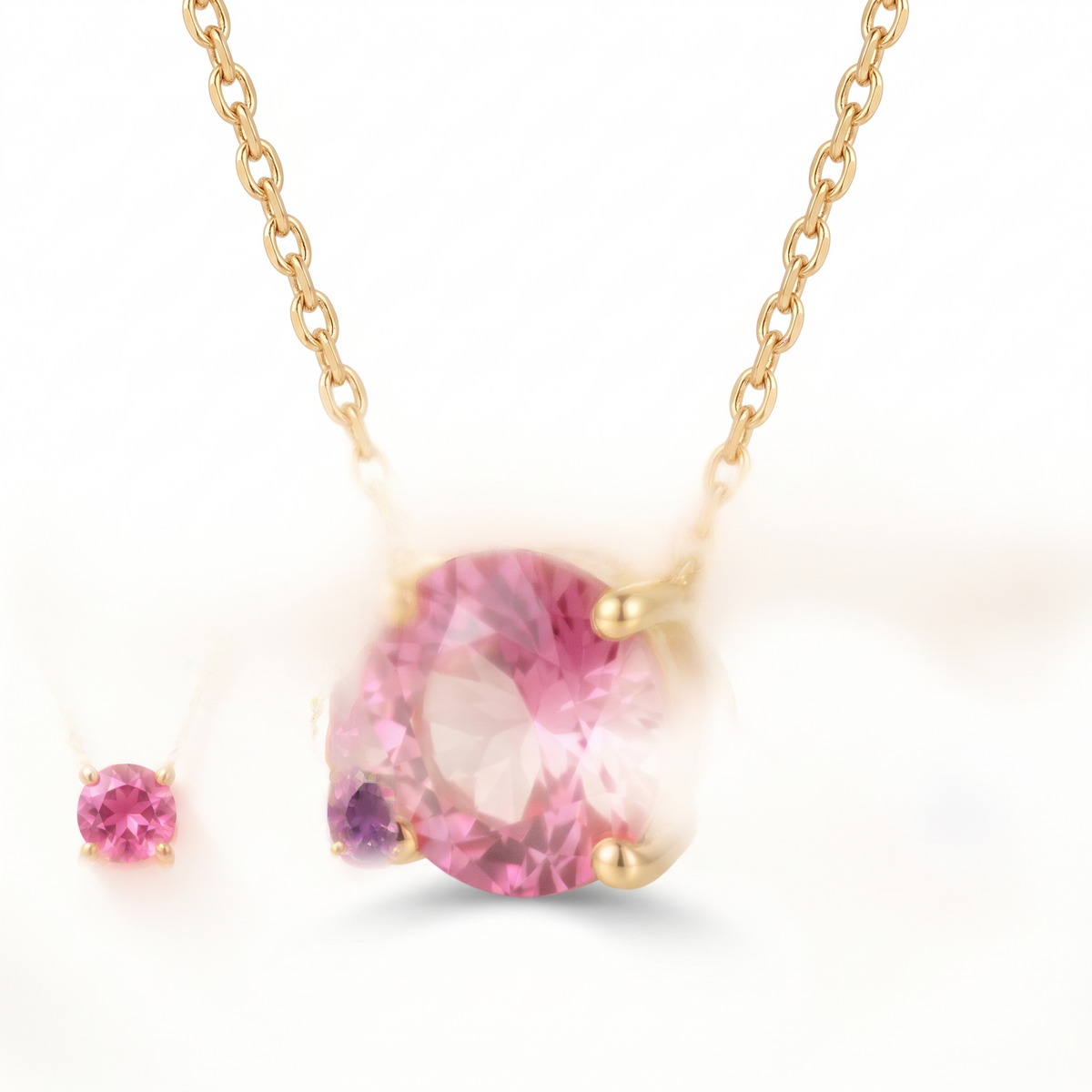 Round-cut pink tourmaline solitaire necklace, angled front detail — AI-generated design representation