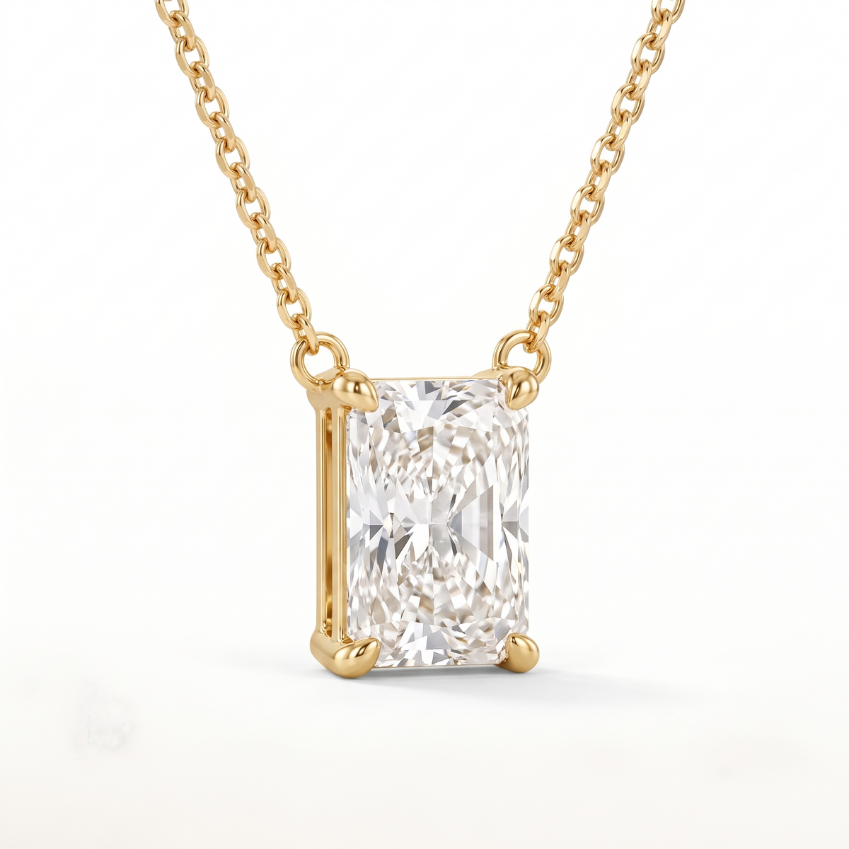 Radiant-cut diamond solitaire necklace, angled front detail — AI-generated design representation