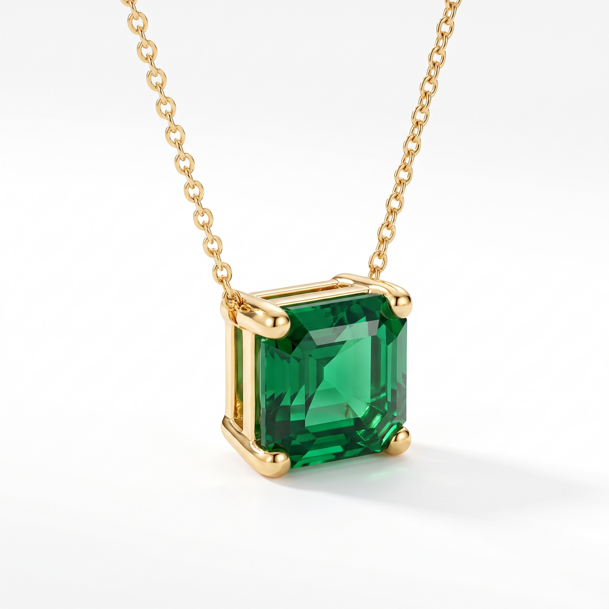 Asscher-cut emerald solitaire necklace, angled front detail — AI-generated design representation