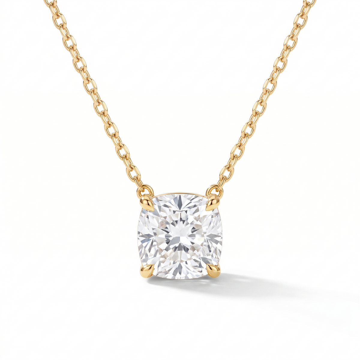 Cushion-cut diamond solitaire necklace in solid gold, catalog view — AI-generated design representation