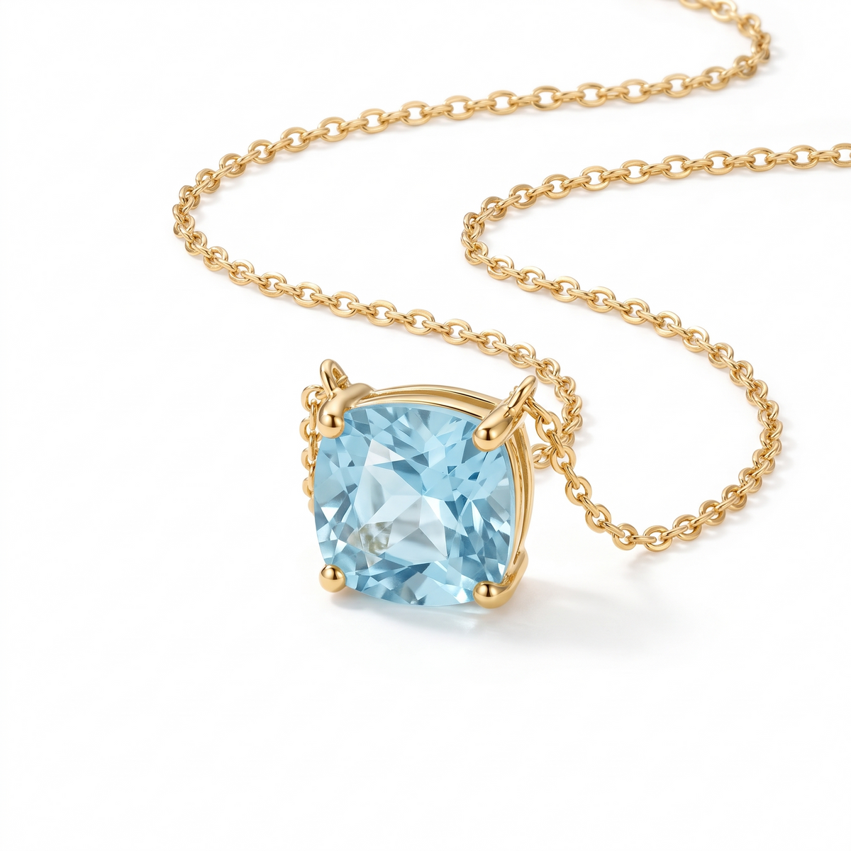 Cushion-cut aquamarine solitaire necklace in solid gold, catalog view — AI-generated design representation