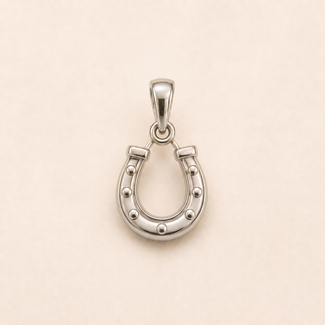Horseshoe pendant — reused white-gold design rendering for the sterling-silver counterpart