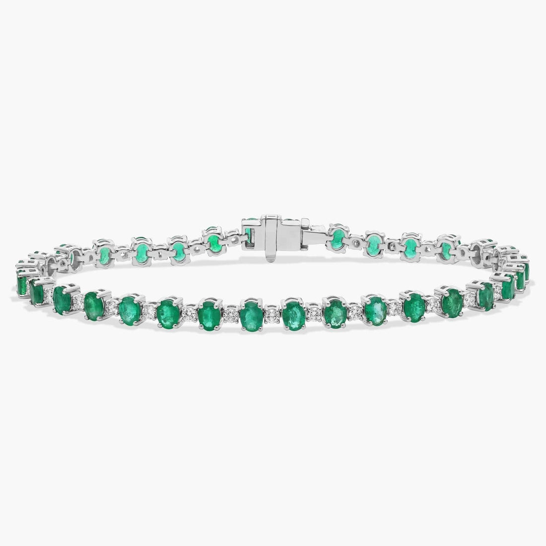 Alternating Diamond and Oval Emerald Tennis Bracelet in 14K White Gold