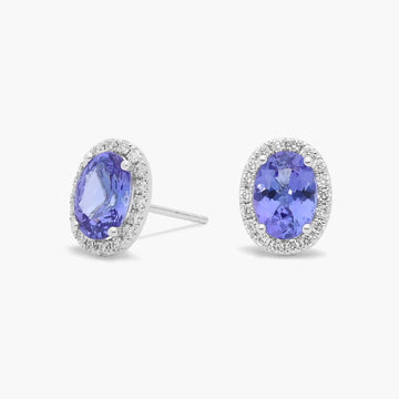 Oval Tanzanite and Diamond Halo Stud Earrings in 14k White Gold (5x7mm)