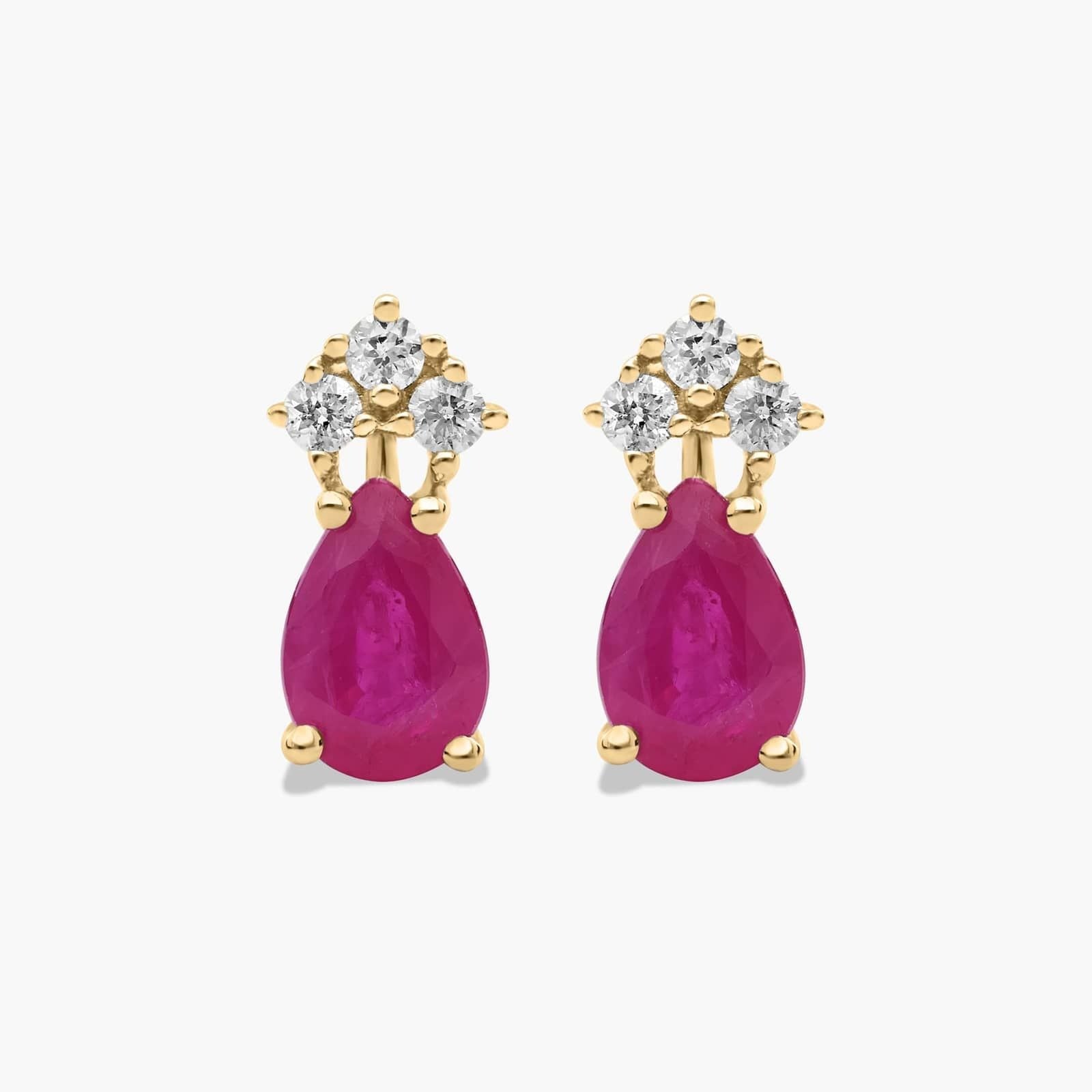 Pear Shape Ruby And Tri-Diamond Stud Earrings In 14K Yellow Gold