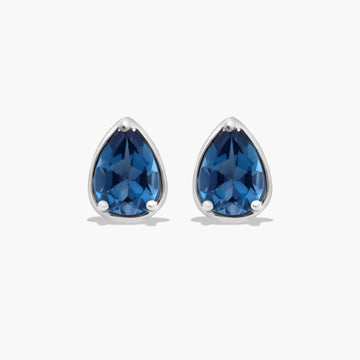 Radiant Reflections Pear Shape Blue Topaz Stud Earrings In 14K White Gold