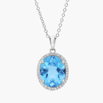 Swiss Blue Topaz and White Sapphire Halo Oval Pendant in Sterling Silver (12x10mm)