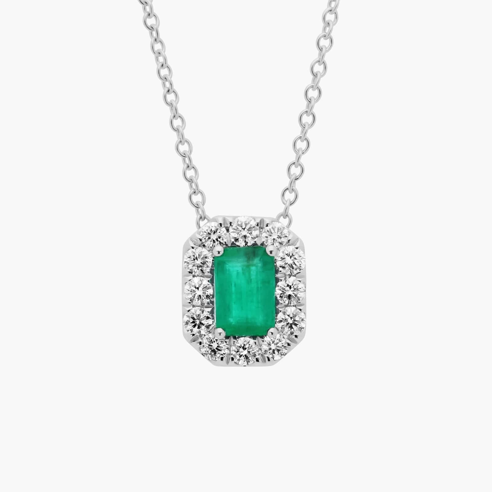 Emerald Cut Emerald and Diamond Halo Pendant in 14k White Gold