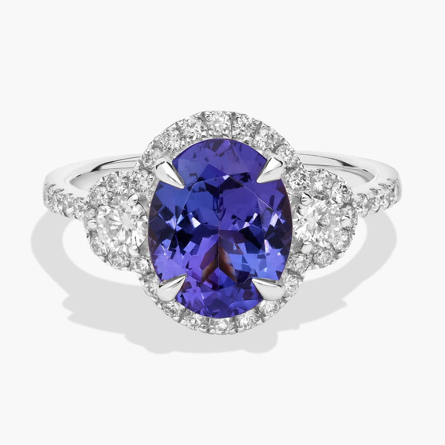 Oval Cut Tanzanite Diamond Side Stone Ring in 14k White Gold (10x8mm)