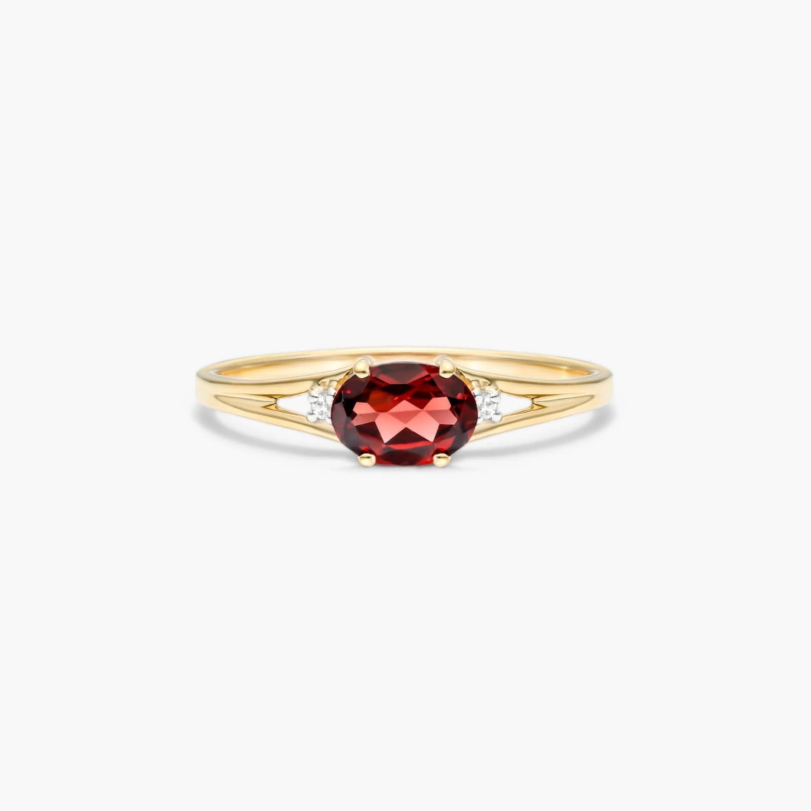 Oval Garnet And Diamond Accent Birthstone Ring In 14K Yellow Gold