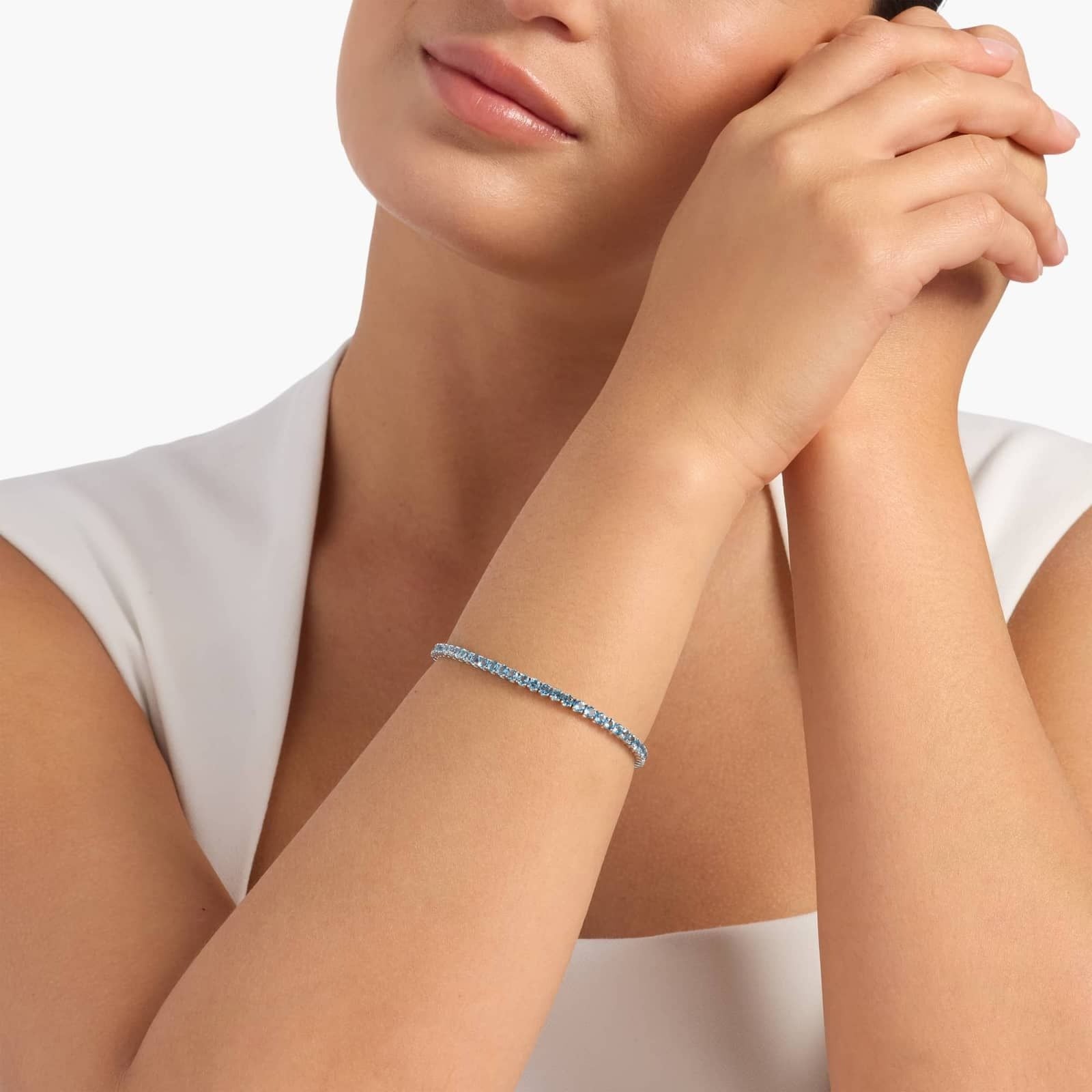 Blue Topaz Birthstone Tennis Bracelet in 14K White Gold