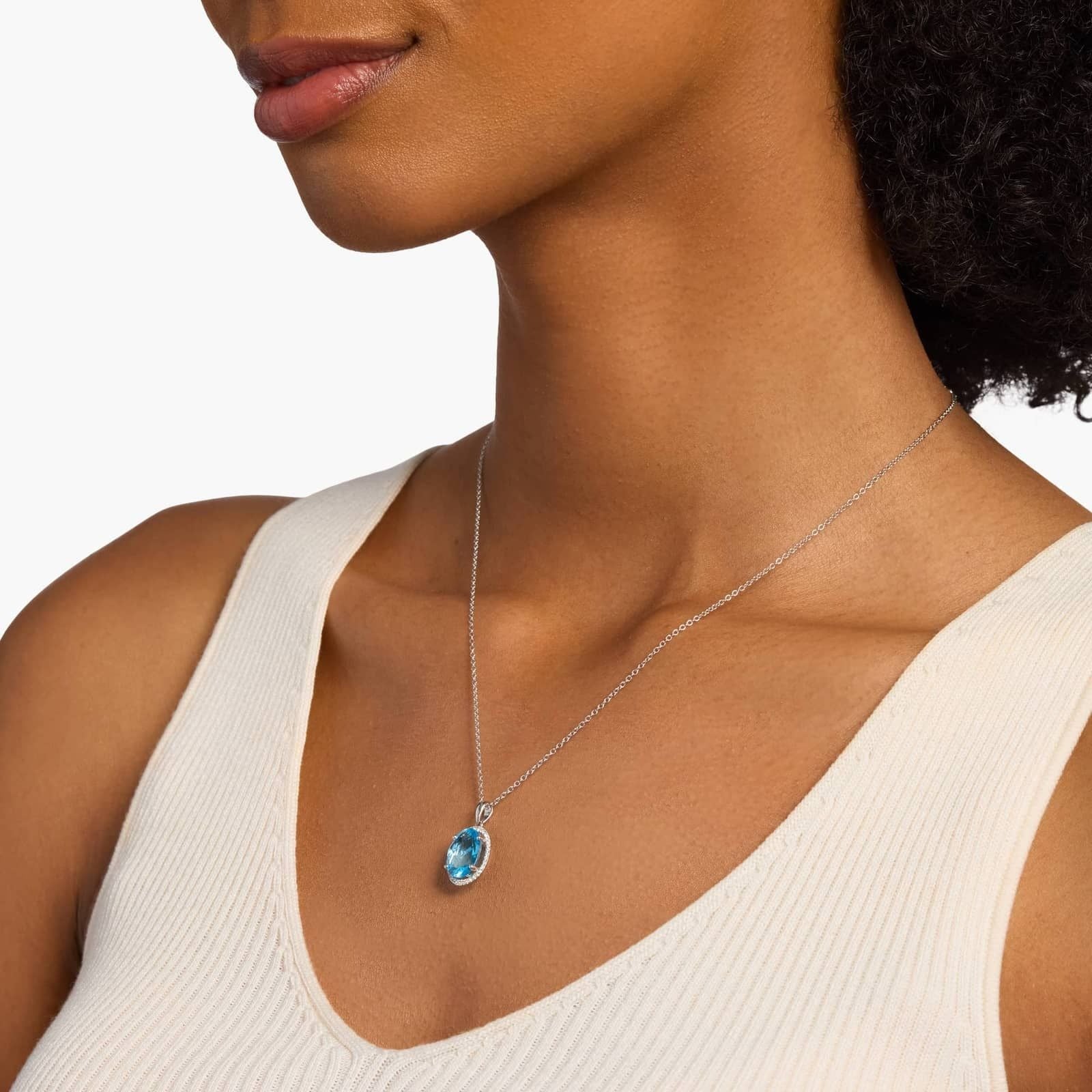 Swiss Blue Topaz and White Sapphire Halo Oval Pendant in Sterling Silver (12x10mm)