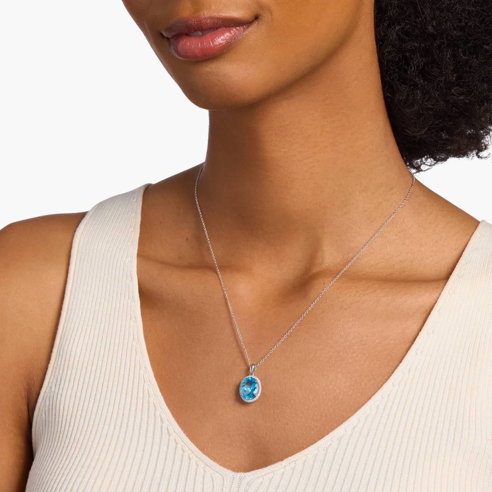 Swiss Blue Topaz and White Sapphire Halo Oval Pendant in Sterling Silver (12x10mm)