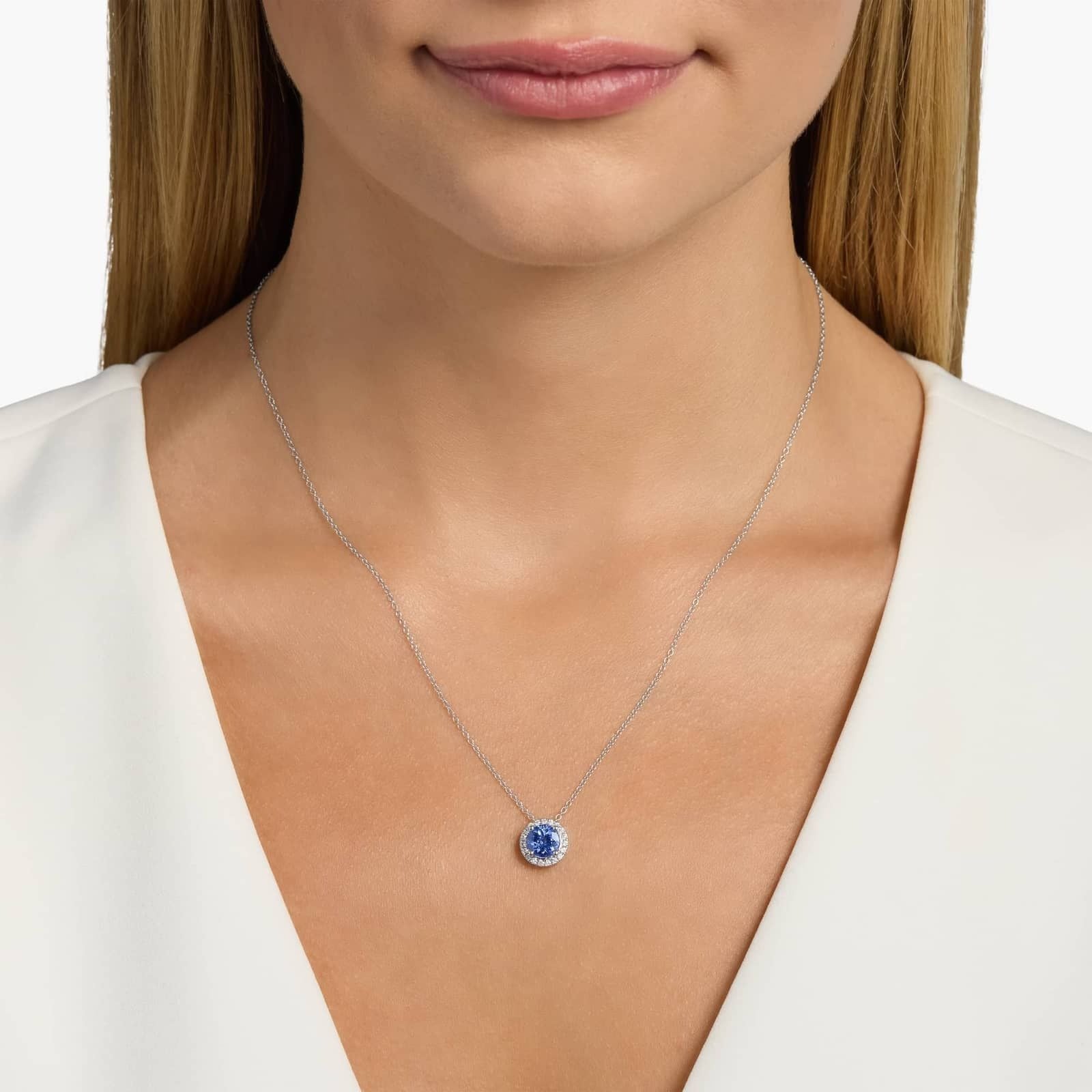 Tanzanite and Diamond Halo Pendant in 14k White Gold (7mm)