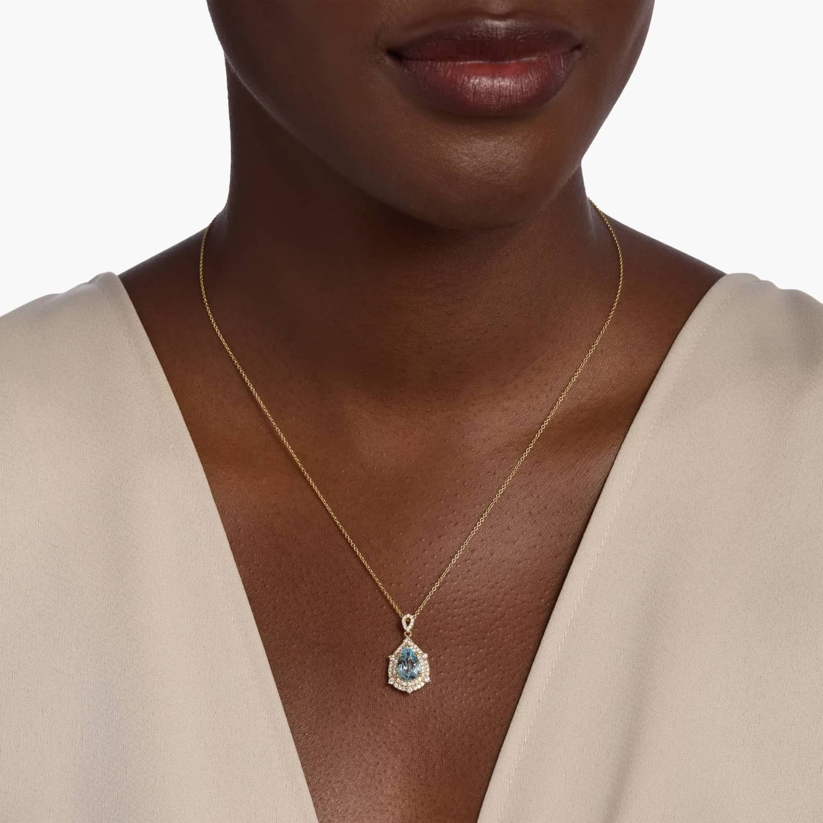 Round Aquamarine Pendant in 14k Yellow Gold (7mm)