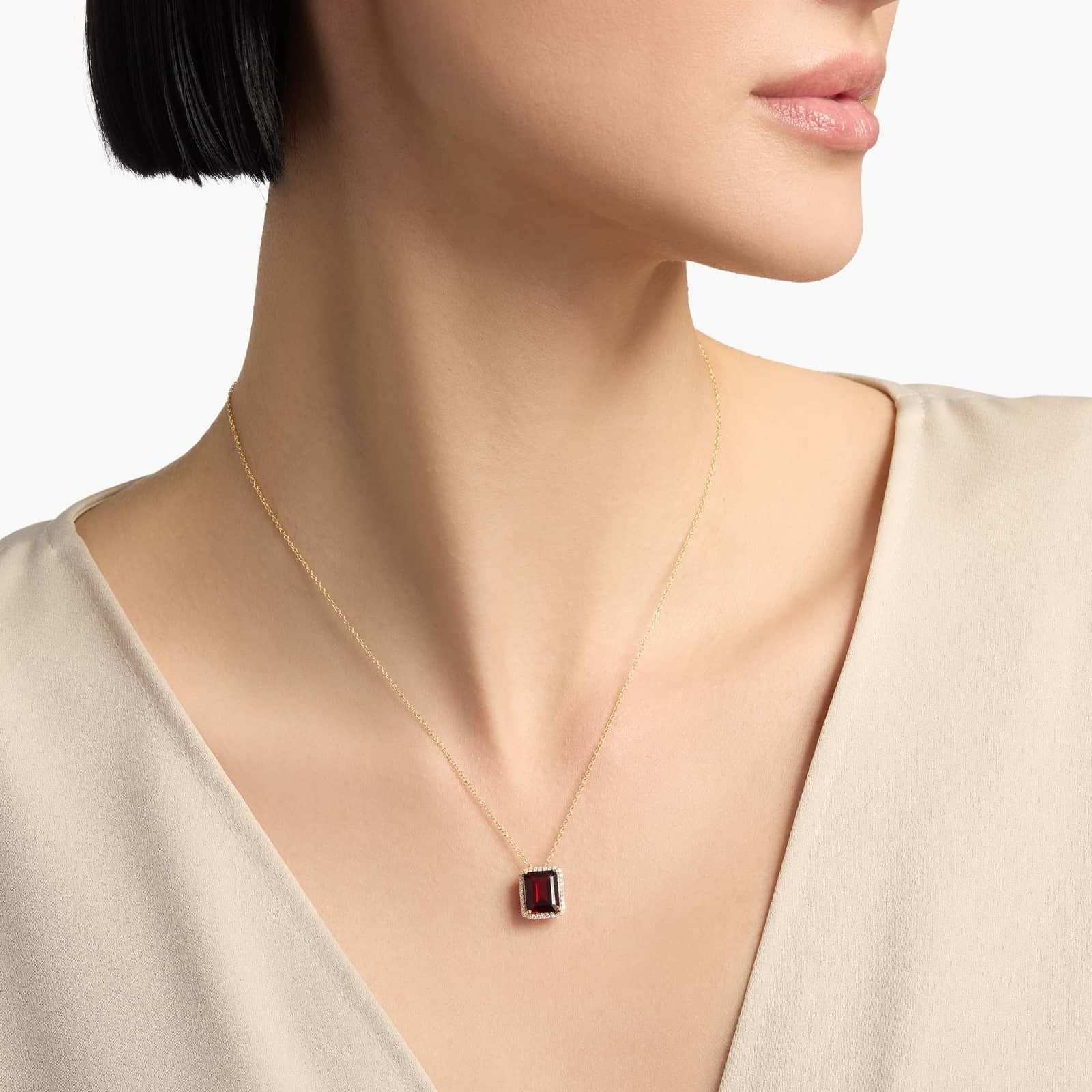 Emerald Cut Garnet Pendant in 14K Yellow Gold