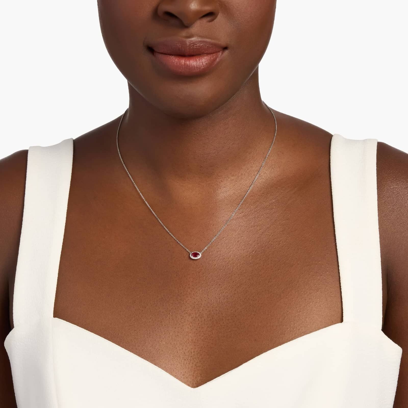 East West Oval Halo Ruby and Diamond Necklace in 18K White Gold (6x4mm)