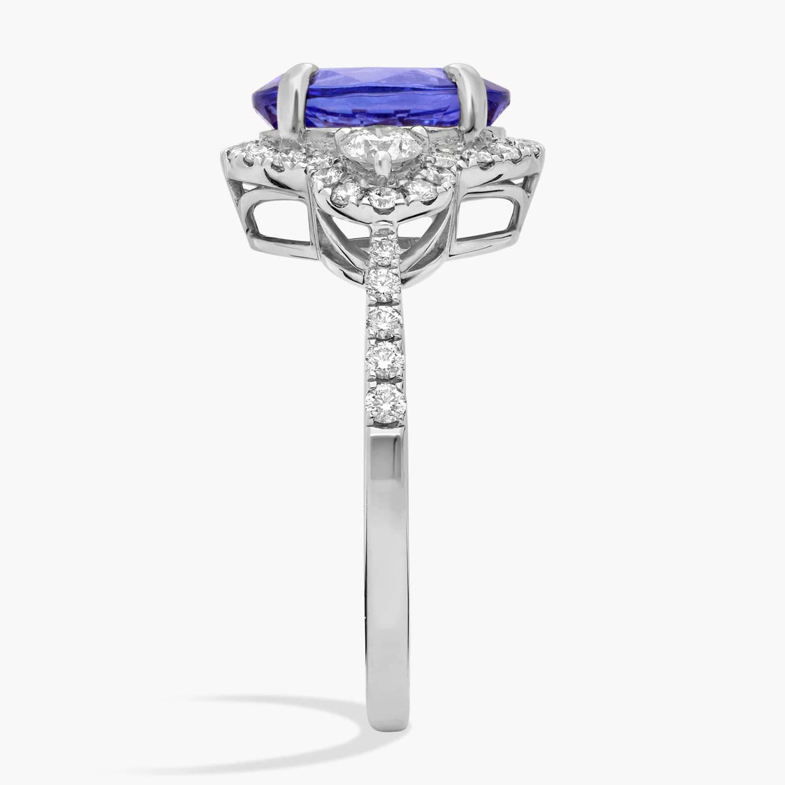 Oval Cut Tanzanite Diamond Side Stone Ring in 14k White Gold (10x8mm)