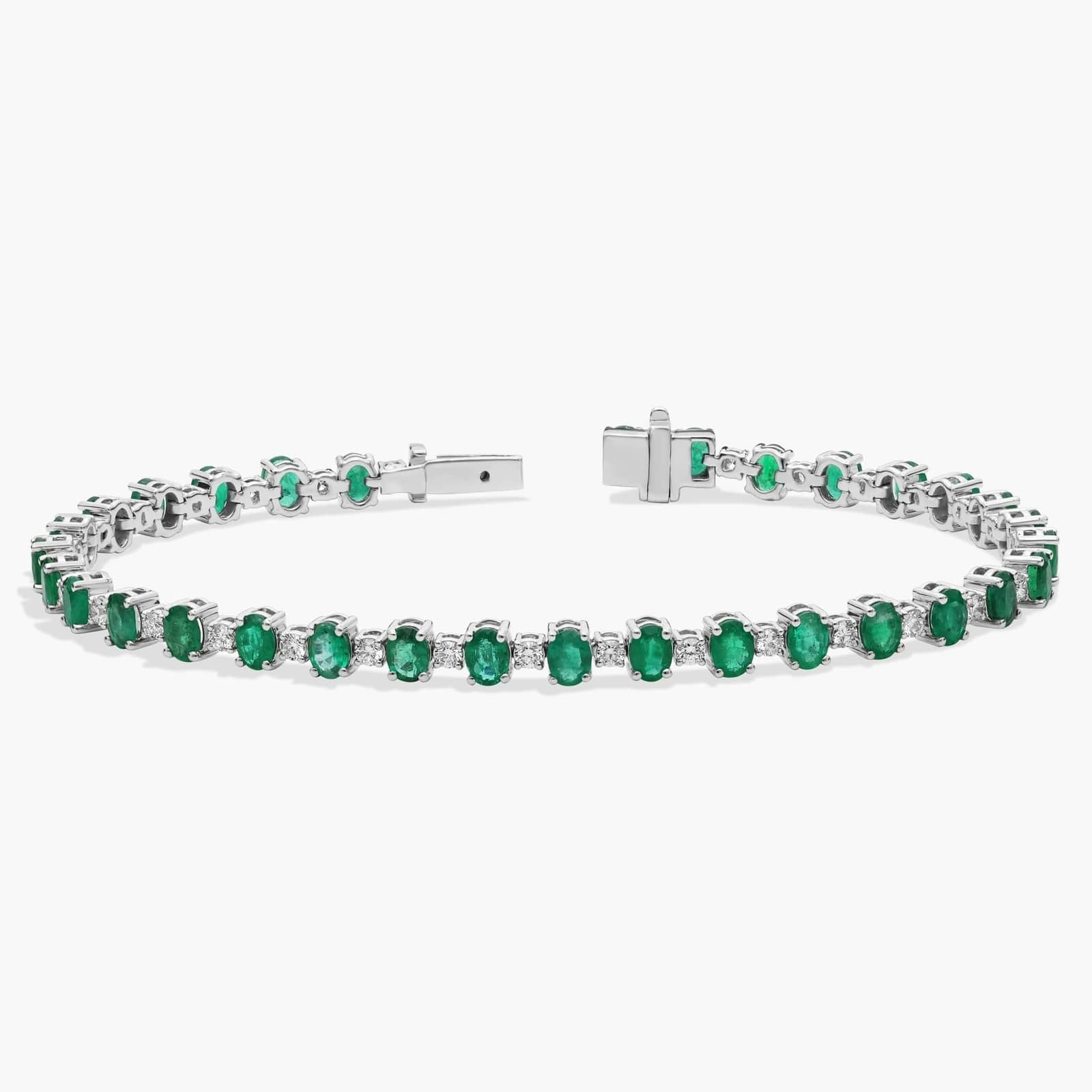 Alternating Diamond and Oval Emerald Tennis Bracelet in 14K White Gold