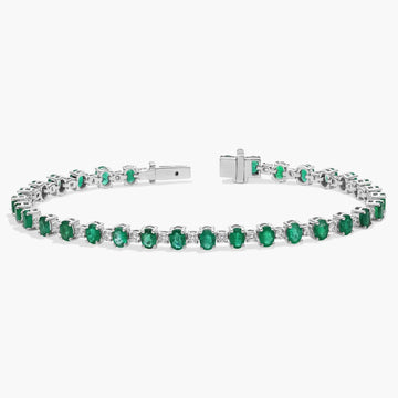 Alternating Diamond and Oval Emerald Tennis Bracelet in 14K White Gold